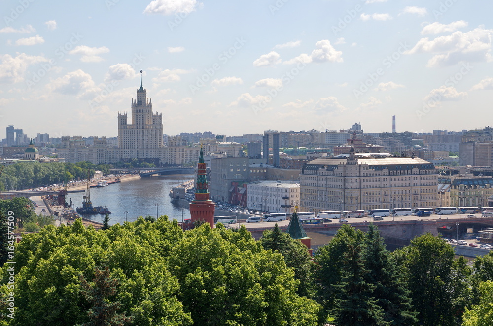 Moscow, Russia - July 11, 2017: Top view of the embankments of the Moscow-river and the skyscraper on Kotelnicheskaya embankment