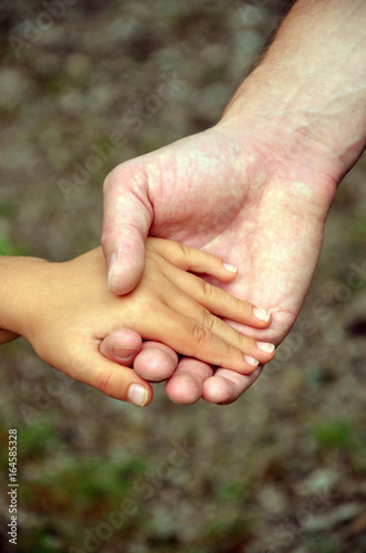 hands of a man and a child very nice © Photo&Graphic Stock