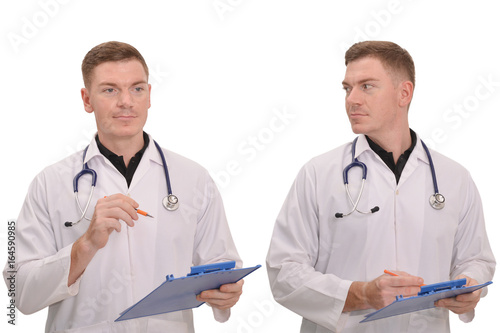 Portrait of young male doctor working on white background