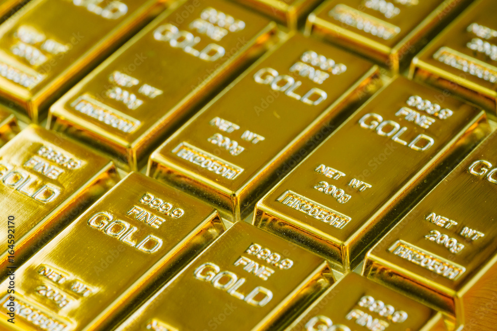 selective focus on shiny gold bars as financial investment and wealth concept selective focus on shiny gold bars as financial investment and wealth concept