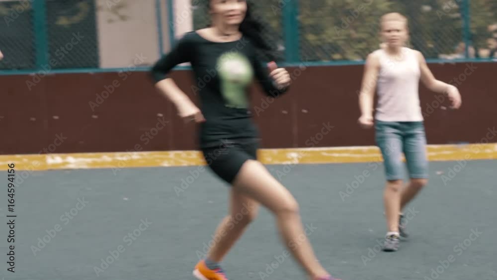 Woman playing soccer football. Female footballe player Woman playing soccer football. Female footballe player