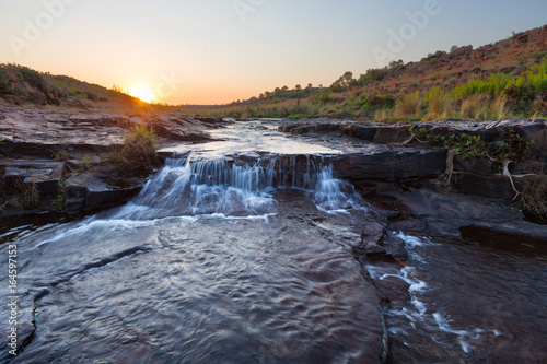 Small waterfall at sunset