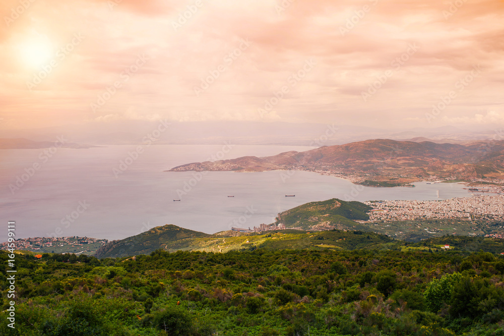 Panorama of the Greek city of Volos at sunset. Volos Greece. View from the mountain on the Volos
