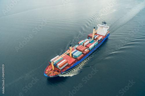 Container vessel sailing in open sea
