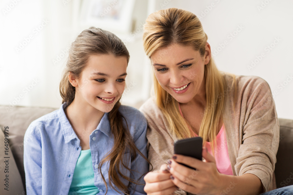 happy family with smartphone at home happy family with smartphone at home