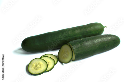 Closeup of cucumbers on a white background
