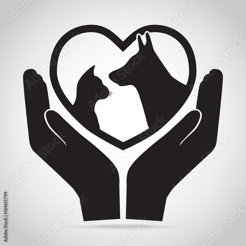 Dog and Cat with heart in hands icon. Protection, care and help concept
