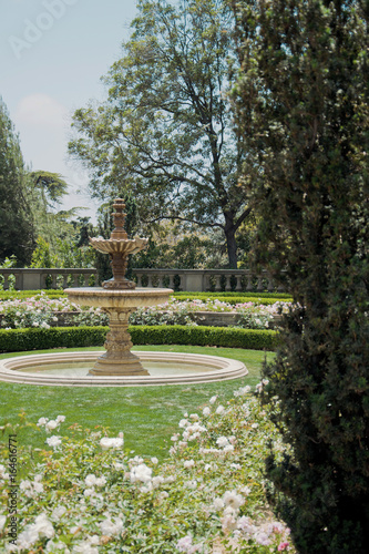 Flowerbeds and fountain in one of the park