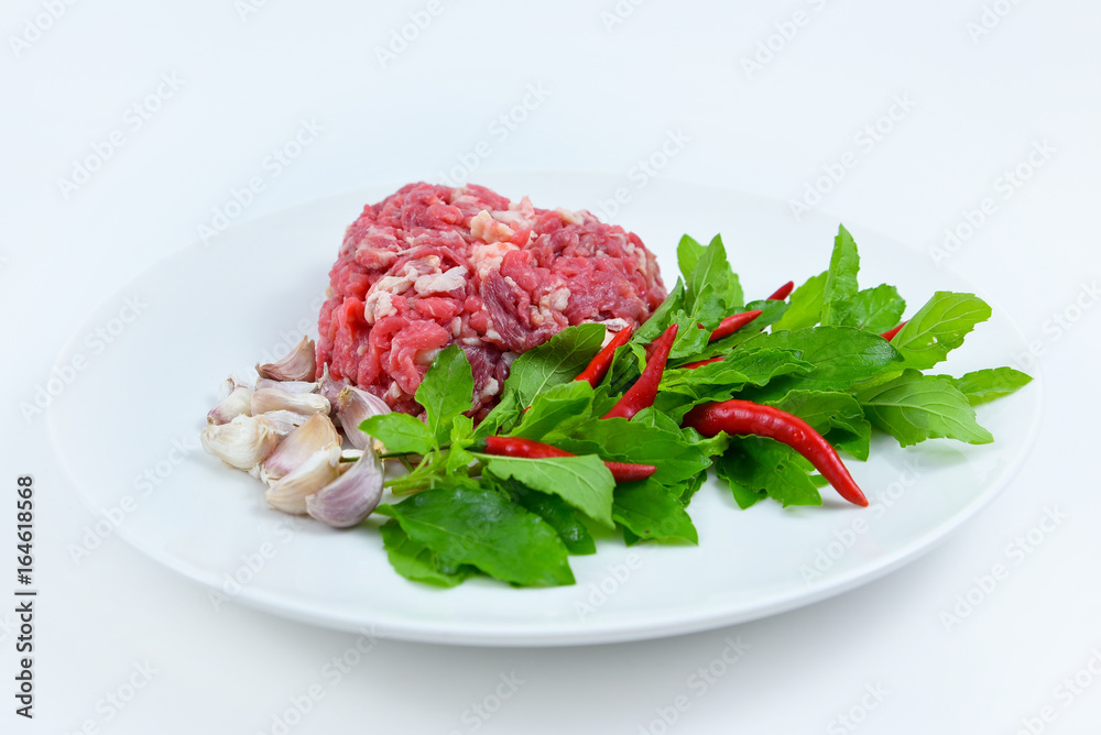 Ingredients of spicy fried meat with basil leaves. Ingredients of spicy fried meat with basil leaves.