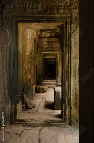 Aligned porticoes and gates form a corridor around Angkor Thom central temple in Angkor Wat  Cambodia