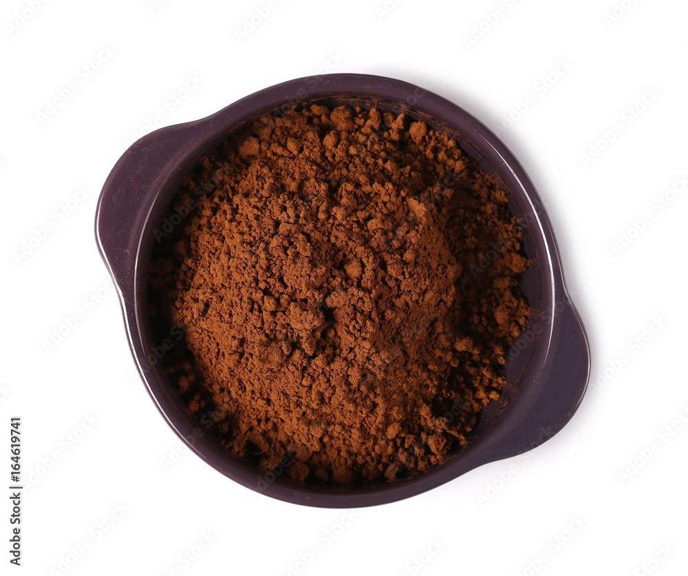 pile cocoa powder and porcelain bowl isolated on white background pile cocoa powder and porcelain bowl isolated on white background