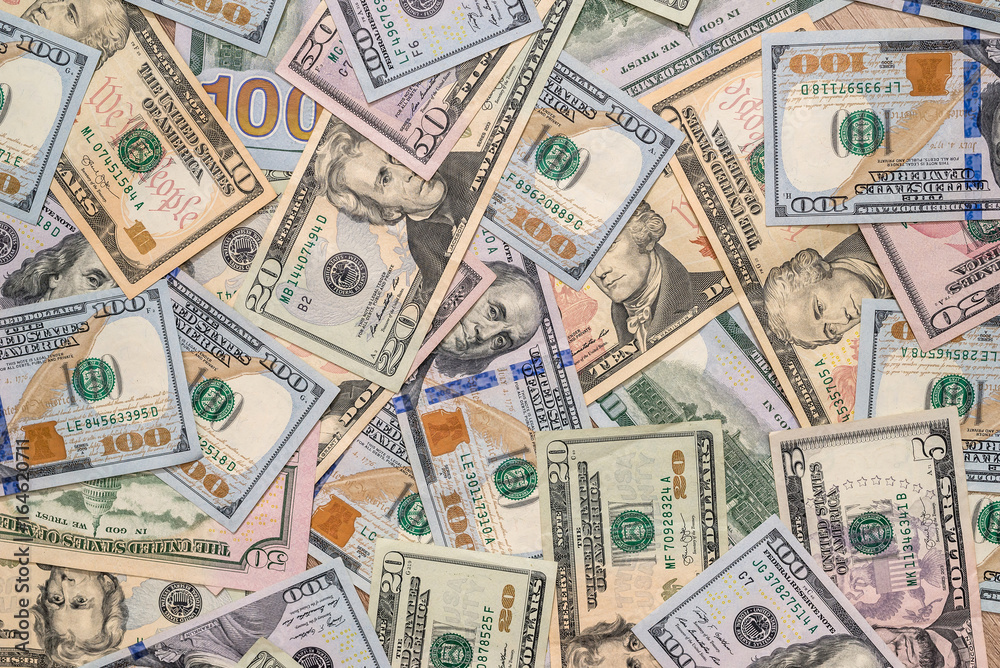 Many us dollars pile as background. close up Many us dollars pile as background. close up