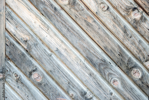 gray wooden fence panels as background close up