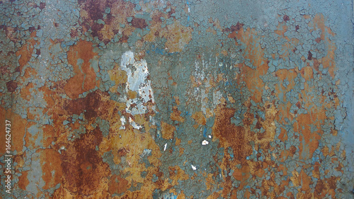 Corroded metal background. Rusty metal background with streaks of rust. Rust stains. Rystycorrosion. © onphotoua