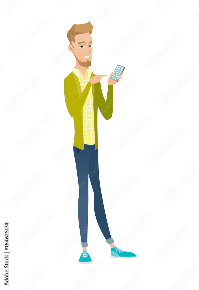 Young caucasian businessman holding mobile phone. Young caucasian businessman holding mobile phone.