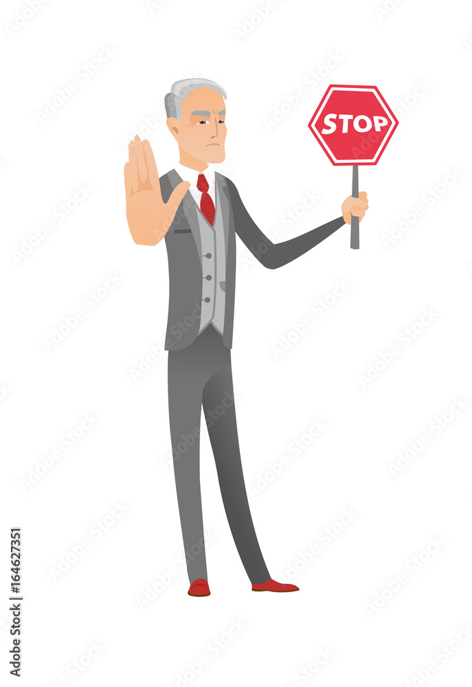 Caucasian businessman holding stop road sign.