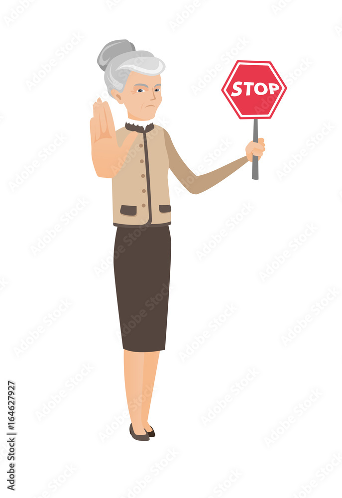 Caucasian business woman holding stop road sign.