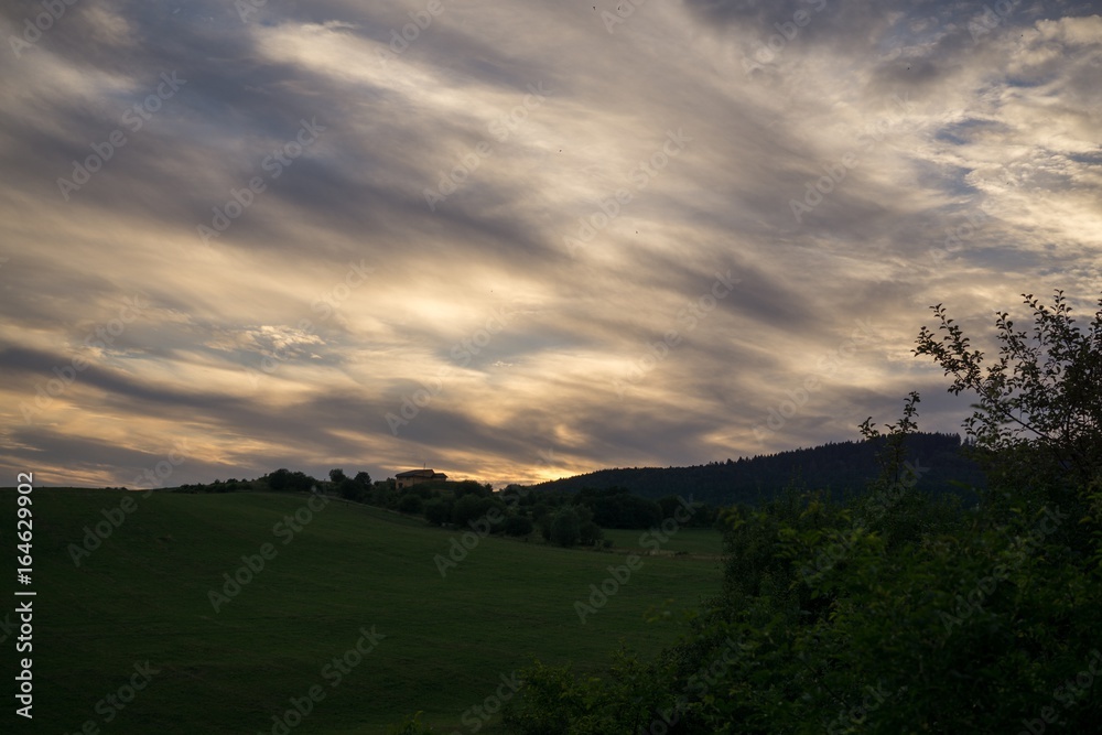 Colorful sunset on meadow. Slovakia