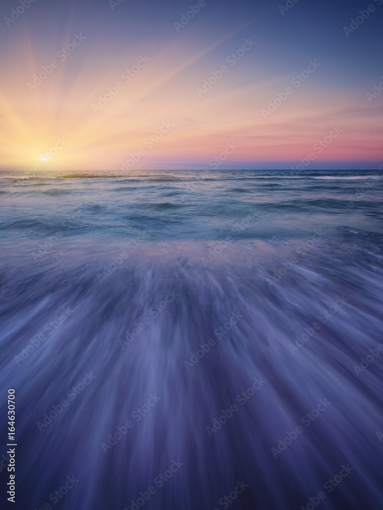 Magnificent long exposure sea sunset