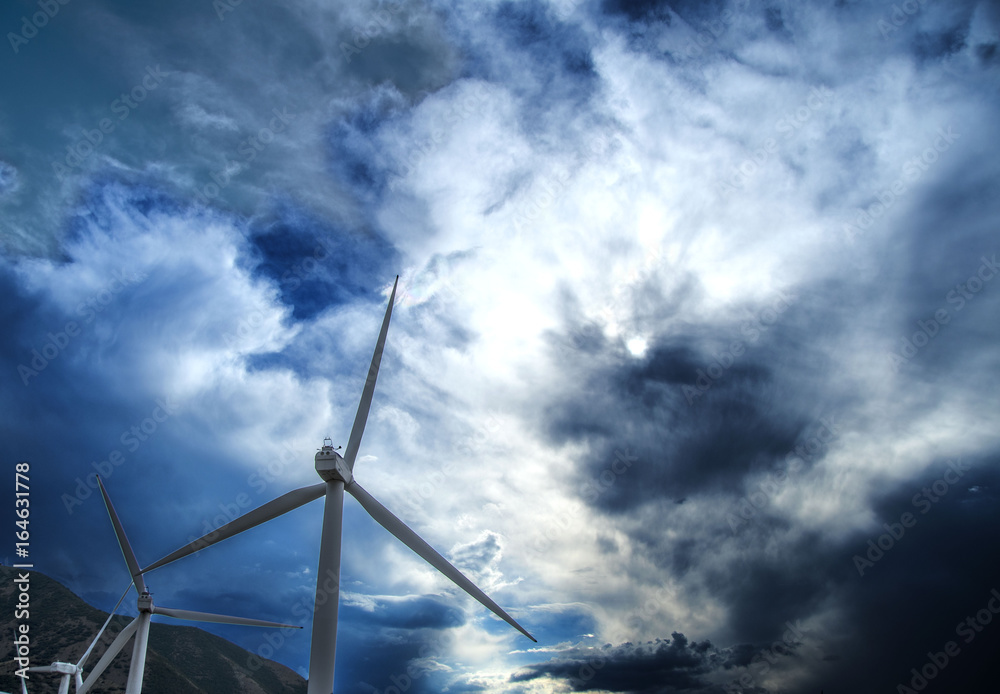 wind turbine with dark clouds wind turbine with dark clouds
