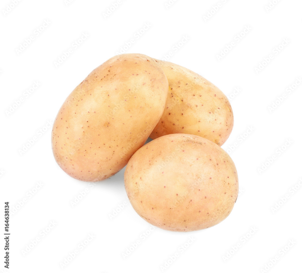 Raw unpeeled potatoes on white background Raw unpeeled potatoes on white background