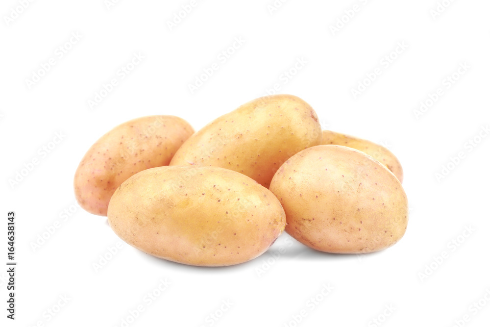 Raw unpeeled potatoes on white background Raw unpeeled potatoes on white background