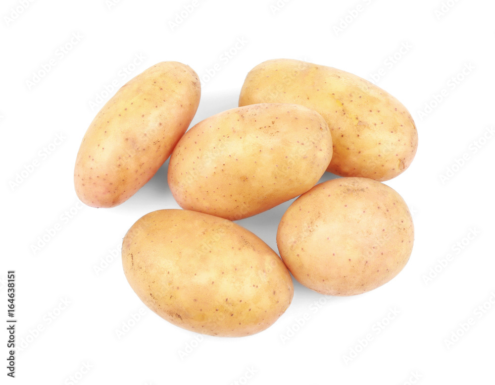 Raw unpeeled potatoes on white background Raw unpeeled potatoes on white background