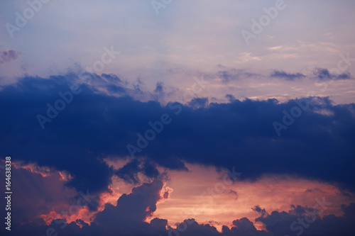 Pink and purple clouds on sunset, dramatic landscape