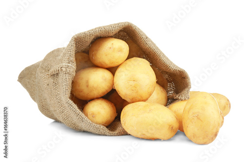 Sack with potatoes on white background