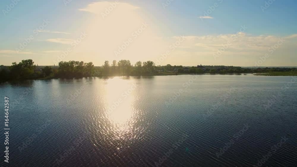 Aerial shot beautiful lake, morning glow, pristine nature Aerial shot beautiful lake, morning glow, pristine nature