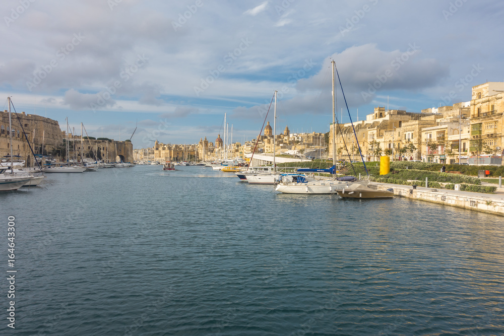 Afternoon sun lighting Vittoriosa Yacht Marina, Valletta, Malta
