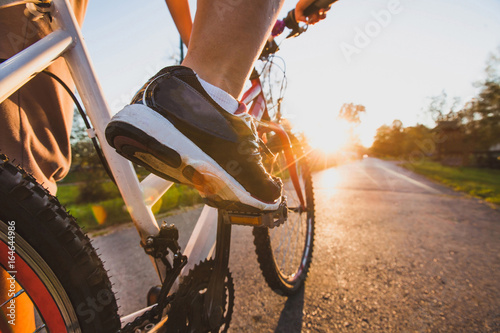 cycling outdoors, close up of the feet on pedal