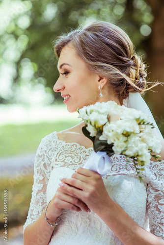 Bouquet in bride's hands photo