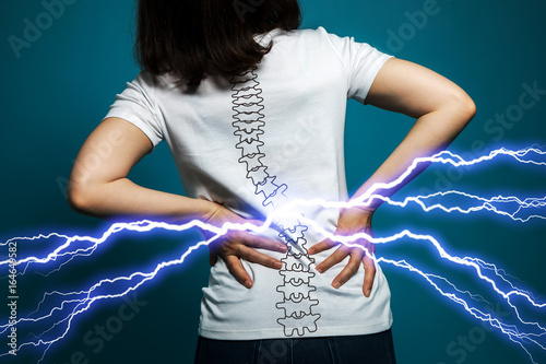 young woman who has backache.