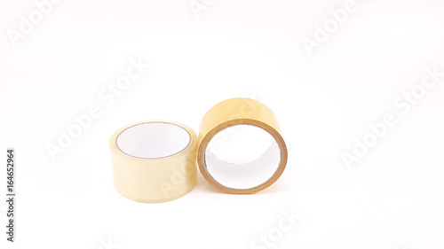 Thick transparent plastic tape and brown plastic tape in white big core