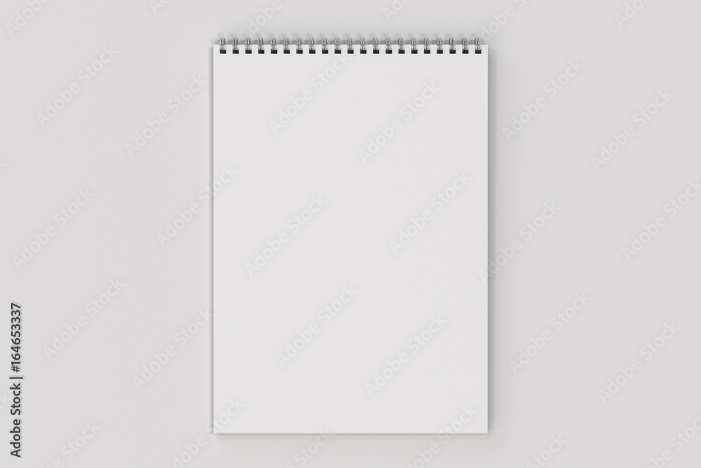 Blank white notebook with metal spiral bound on white background Blank white notebook with metal spiral bound on white background