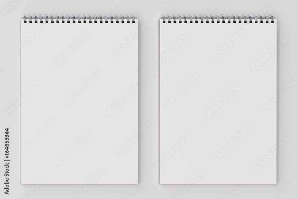 Blank white notebook with metal spiral bound on white background Blank white notebook with metal spiral bound on white background