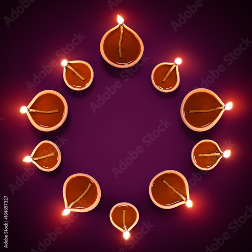 Diya lamps in a circle formation