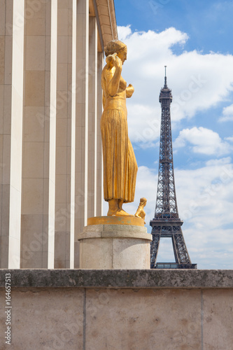 Eiffel tower and statues of Trocadero garden France 