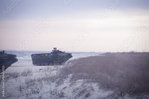 US Navy amphibious personnel carriers take part at a NATO military exercise, on 18 March 2017, in Capu Midia, Romania.