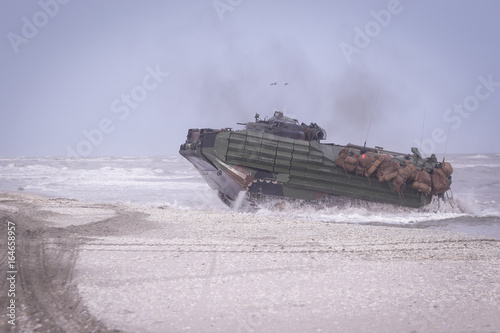 Billede på lærred US Navy amphibious personnel carriers take part at a NATO military exercise, on 18 March 2017, in Capu Midia, Romania