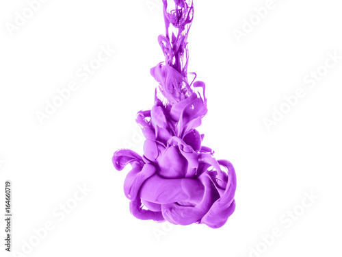 Ink swirl in a water, isolated on white background. The pink, raspberry paint in the water. Soft dissemination a droplets of colored ink in water close-up. Explosion of color splashes acrylic ink.