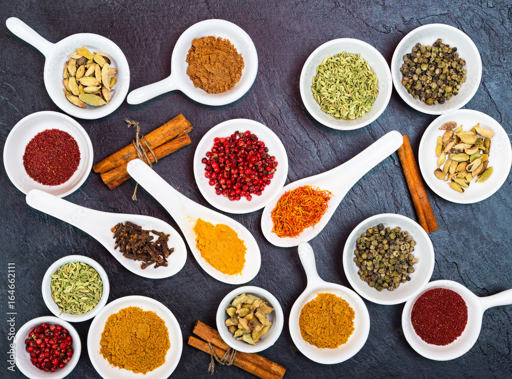 Variety of spices and herbs for cooking meat, fish, chicken and vegetable salads