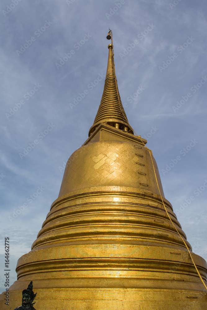 Phu Khao Thong or Golden mountainis a steep artificial hill inside the Wat Saket compound. Bangkok Thailand. Phu Khao Thong or Golden mountainis a steep artificial hill inside the Wat Saket compound. Bangkok Thailand.