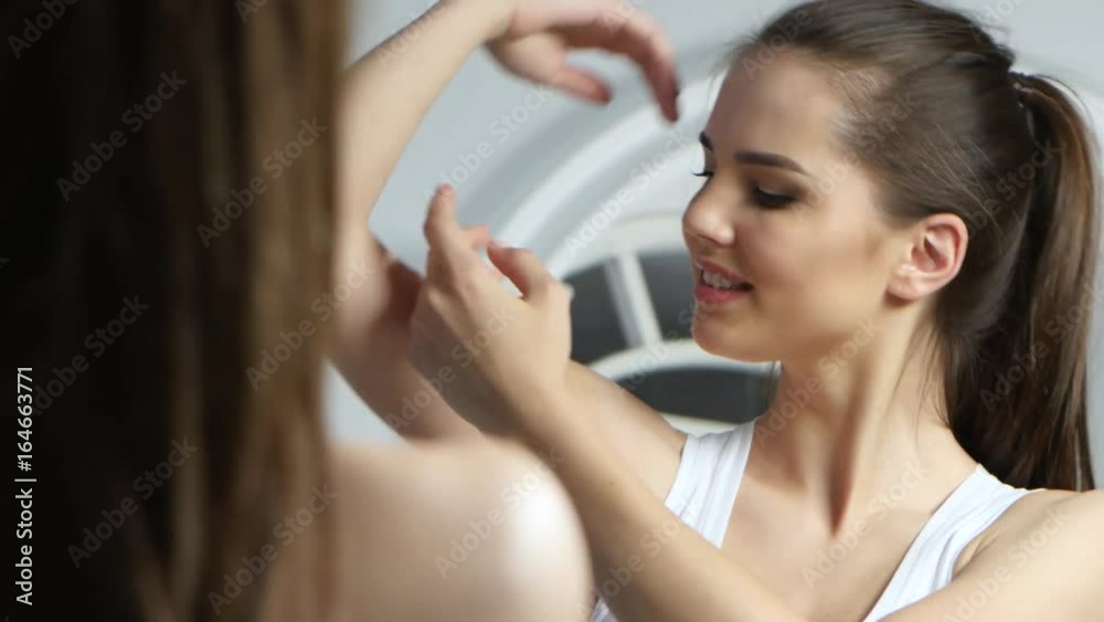 Girl shaves the epilator at her armpits, she's very happy Girl shaves the epilator at her armpits, she's very happy
