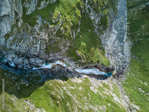 Aerial view of waterfall in swiss mountains