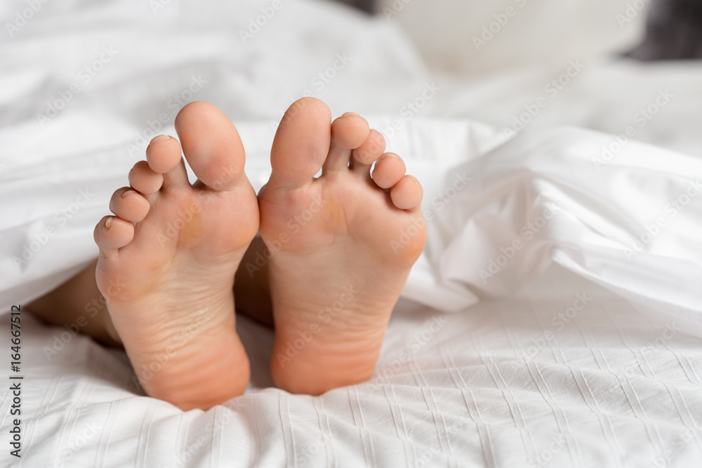 perfect and beautiful woman legs on bed perfect and beautiful woman legs on bed