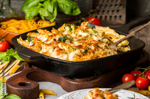 Photos Baked pasta with broccoli, cauliflower, cheese and bechamel sauc