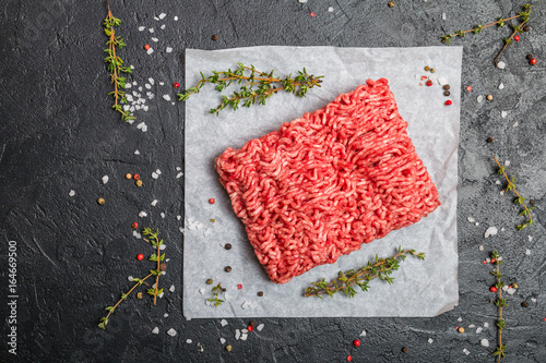 Minced meat with seasoning and fresh thyme