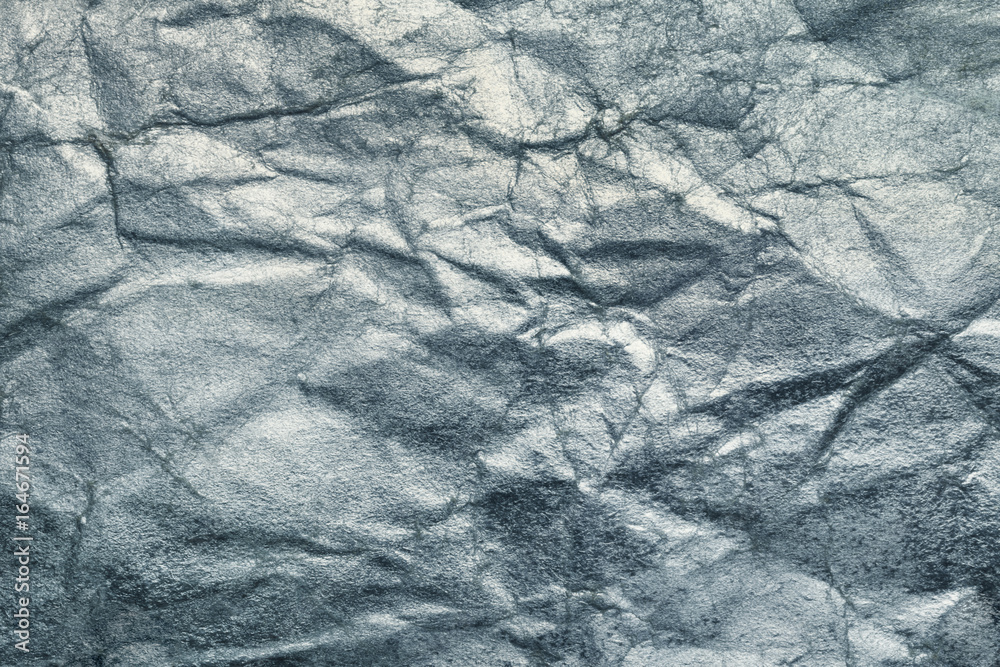 Obraz premium Crumpled silver paper, background